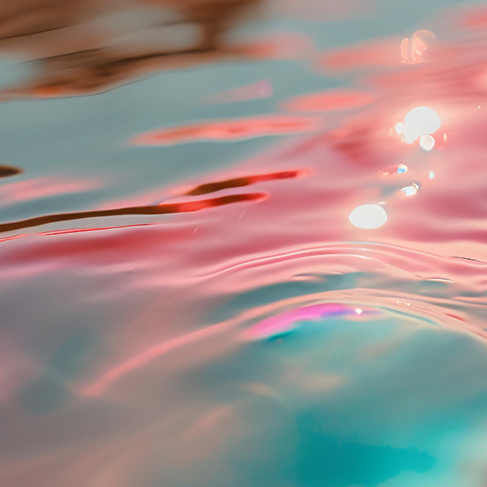 Ripples of pink and blue water